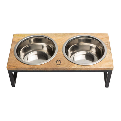 Wooden pet feeder with two stainless steel bowls on a white background