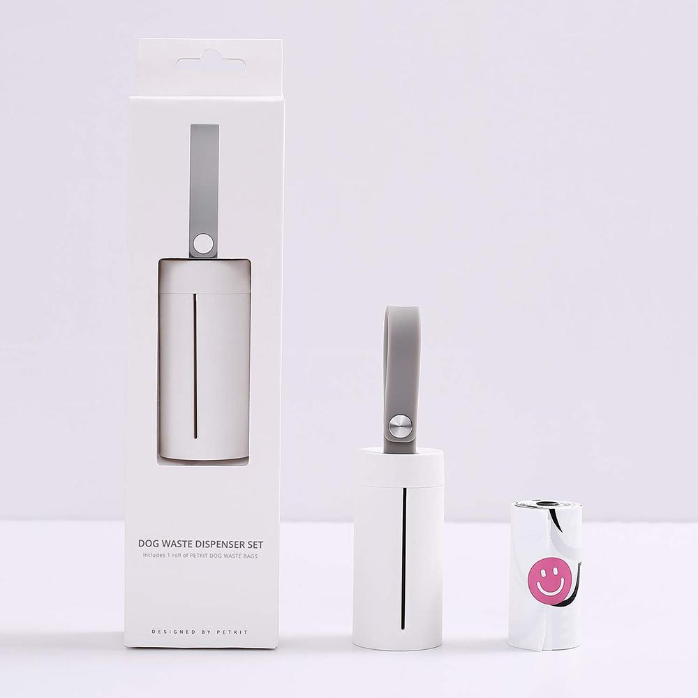 Dog waste dispenser set with packaging on a white background